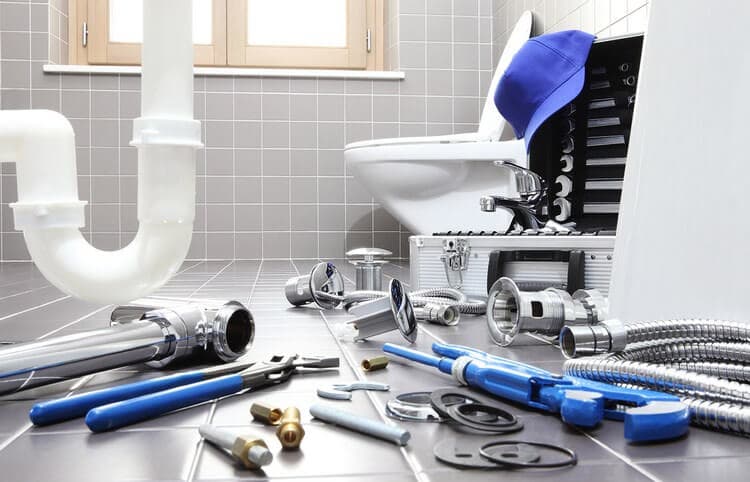 Qualified plumbing engineers at work in England